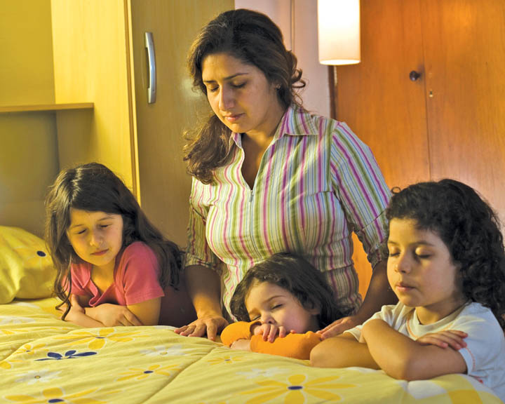 Mormon family praying